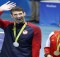 Silver medallist USA's Michael Phelps (L) waves nex to gold medallist Singapore's Schooling Joseph during the medal ceremony of the Men's 100m Butterfly Final during the swimming event at the Rio 2016 Olympic Games at the Olympic Aquatics Stadium in Rio de Janeiro on August 12, 2016. / AFP / Odd Andersen (Photo credit should read ODD ANDERSEN/AFP/Getty Images)
